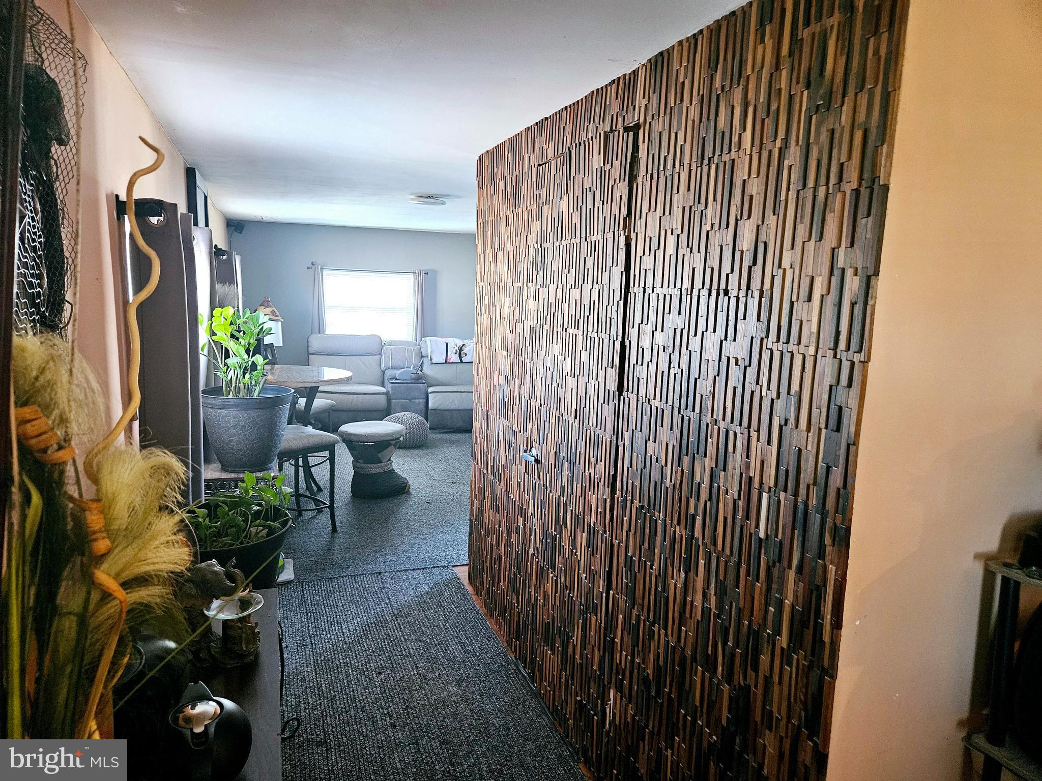 710 Smith Lane Mount Holly, NJ 08060 - Photo 9 of 26 a living room with furniture and a window