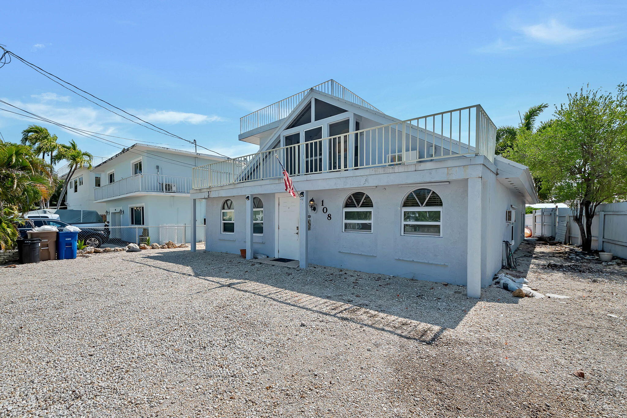 108 Long Ben Drive Key Largo, FL 33037 - Photo 11 of 43 a view of a house with a patio