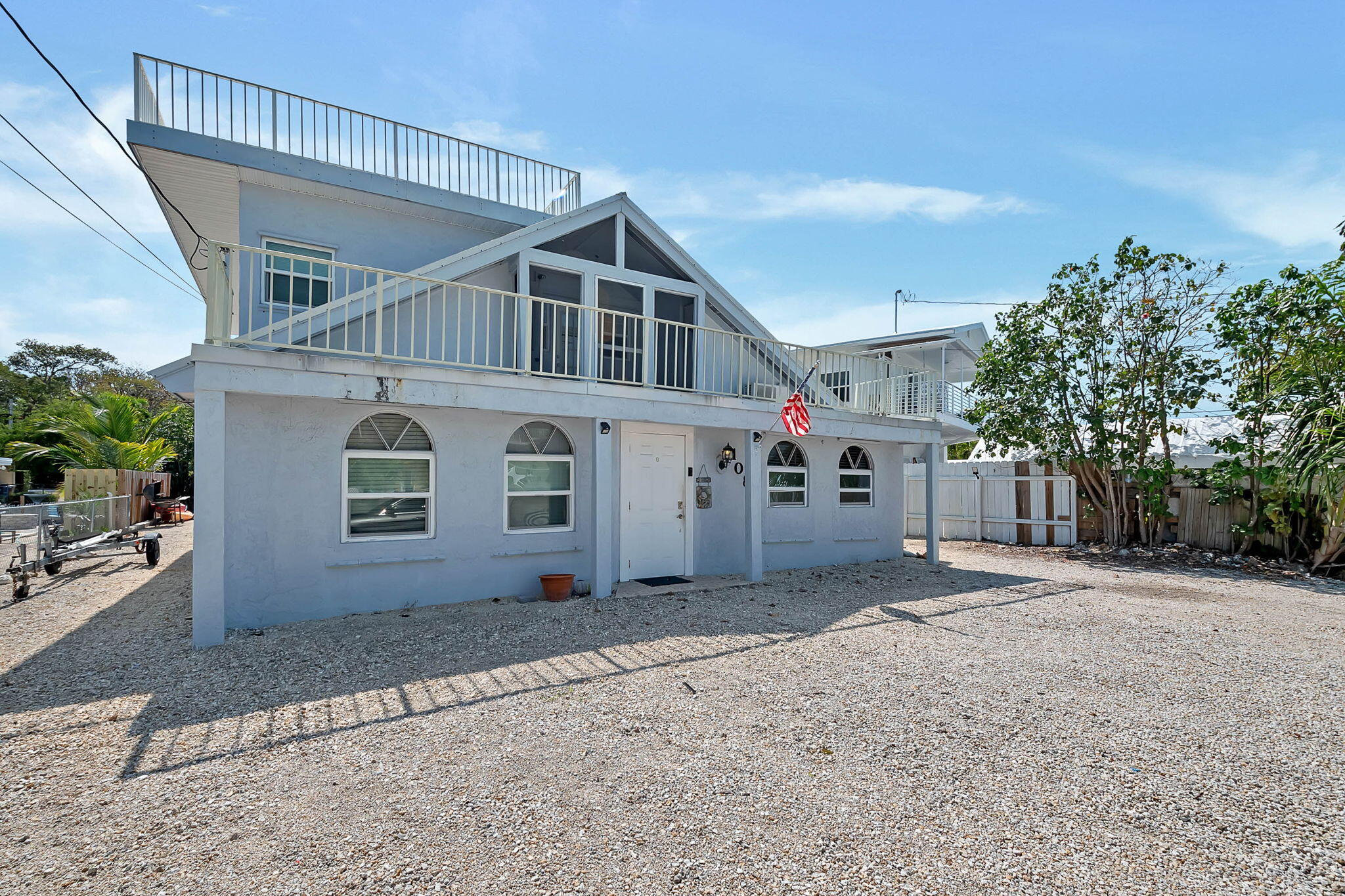 108 Long Ben Drive Key Largo, FL 33037 - Photo 12 of 43 a view of a house with a yard
