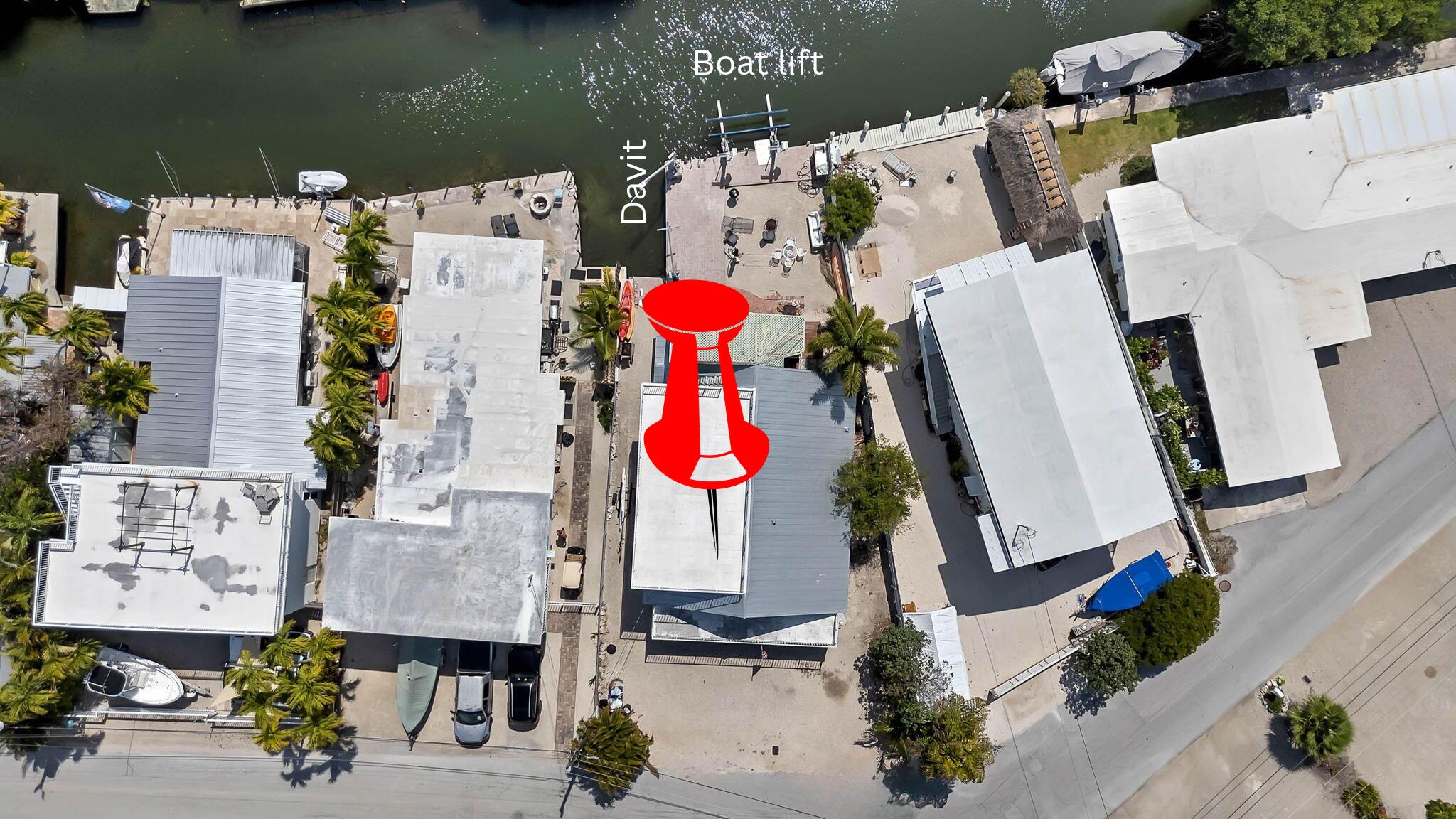 108 Long Ben Drive Key Largo, FL 33037 - Photo 2 of 43 an aerial view of residential house with outdoor space and parking