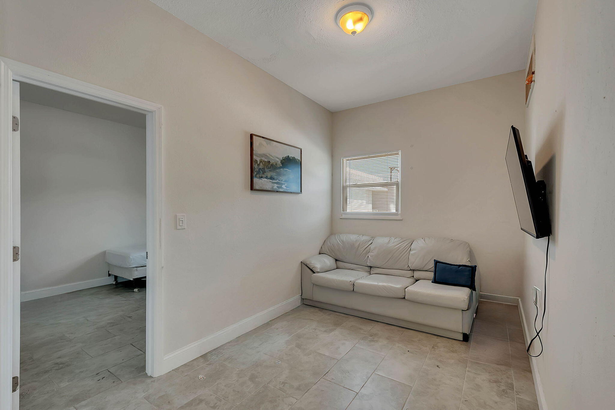 108 Long Ben Drive Key Largo, FL 33037 - Photo 27 of 43 a living room with furniture and a flat screen tv