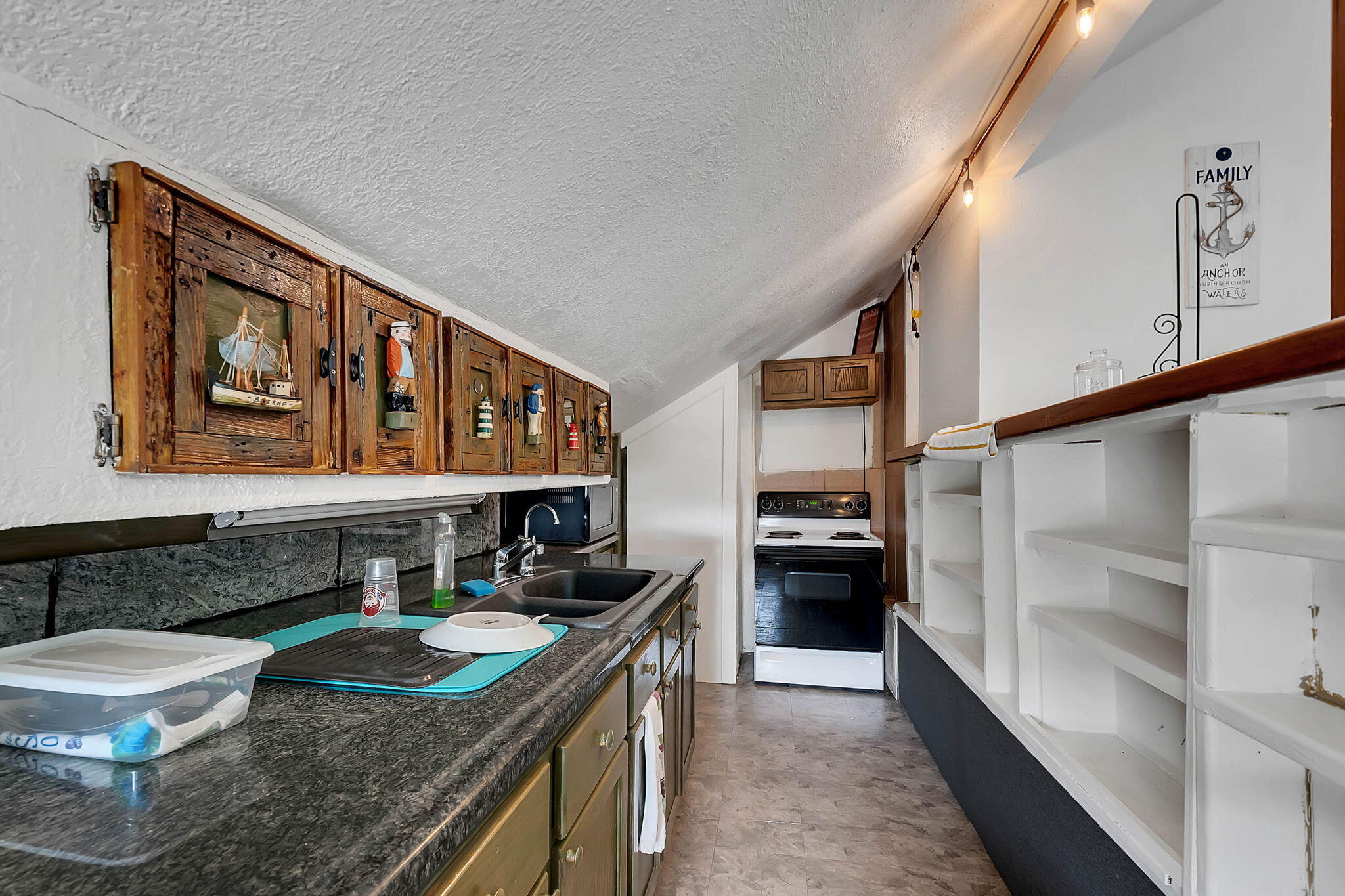 108 Long Ben Drive Key Largo, FL 33037 - Photo 30 of 43 a kitchen with stainless steel appliances granite countertop a sink and a stove