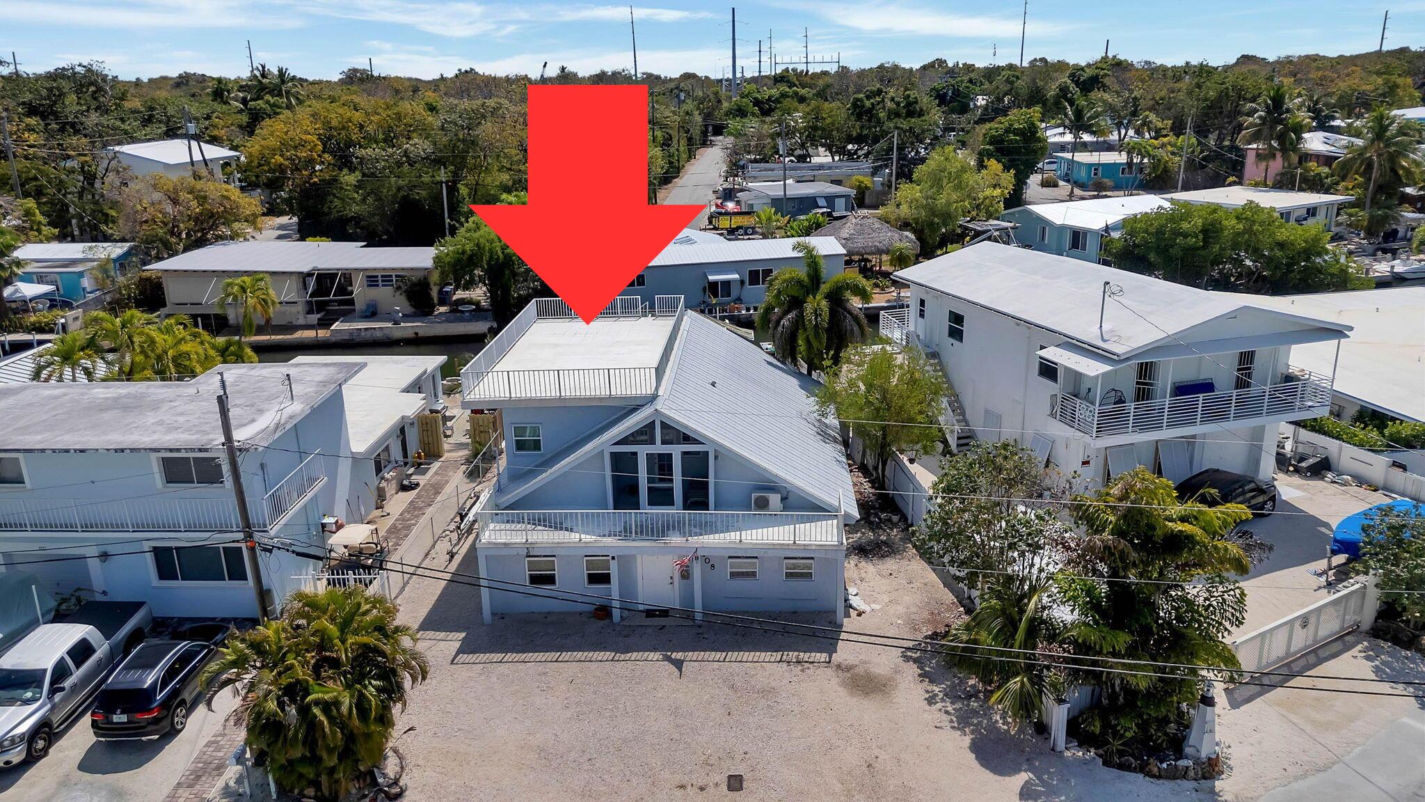 108 Long Ben Drive Key Largo, FL 33037 - Photo 9 of 43 a aerial view of a house