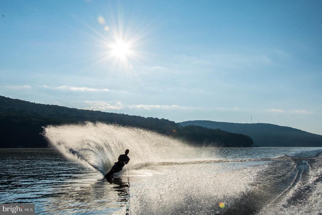 56 Bee Tree Lane Oakland, MD 21550 - Photo 113 of 139 Water skiing on Deep Creek Lake.
