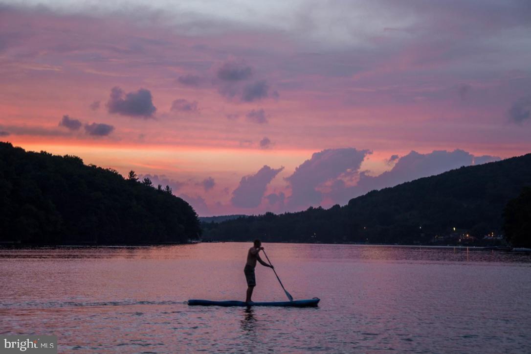 56 Bee Tree Lane Oakland, MD 21550 - Photo 116 of 139 Paddle boarding on Deep Creek Lake