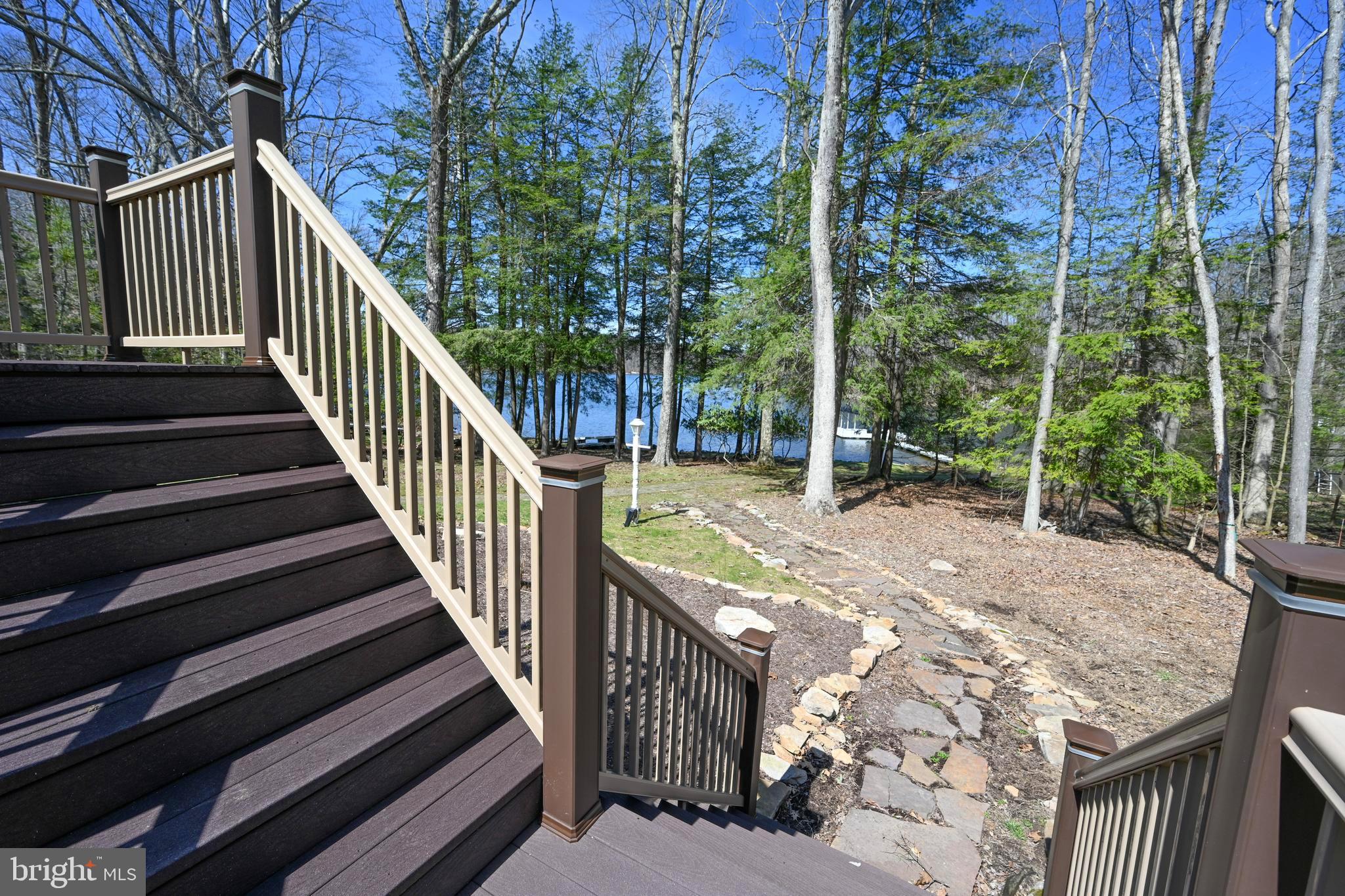 56 Bee Tree Lane Oakland, MD 21550 - Photo 29 of 139 Steps away from the lake from the upper deck.