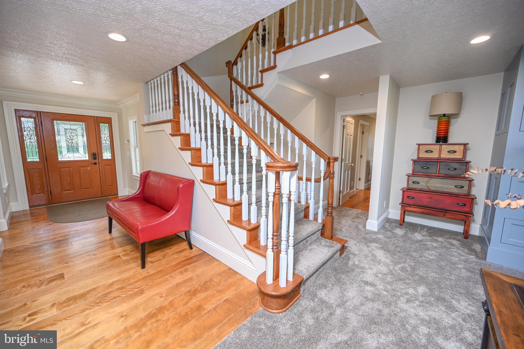 56 Bee Tree Lane Oakland, MD 21550 - Photo 33 of 139 Leading to the main level primary bedroom.
