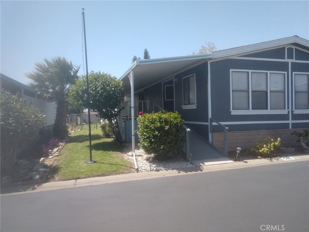 2598-unit 140 Ayala Rialto, CA 92377 - Photo 2 of 5 Side view of Front