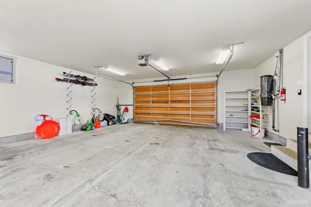 a view of a storage & utility room with toys