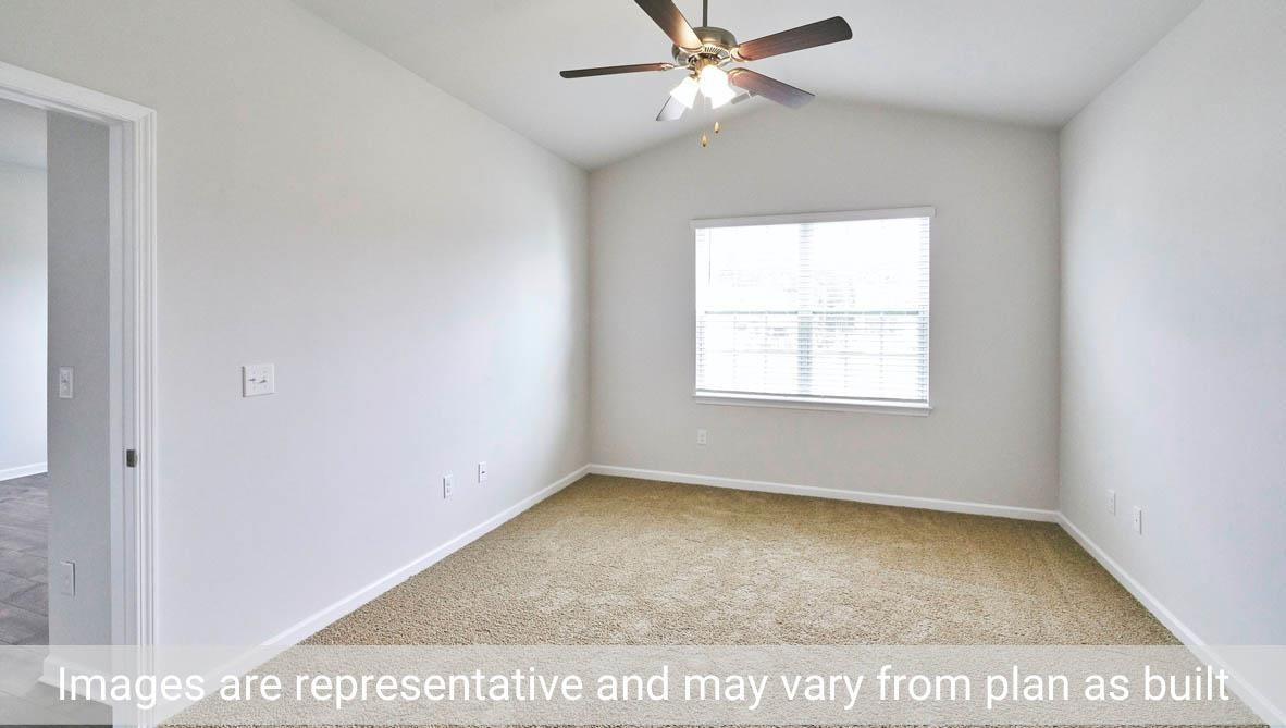 7663 Sand Pit Road Stantonsburg, NC 27883 - Photo 18 of 22 an empty room with a window and ceiling fan