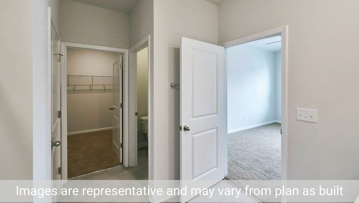 7663 Sand Pit Road Stantonsburg, NC 27883 - Photo 20 of 22 a view of a bathroom from a hallway