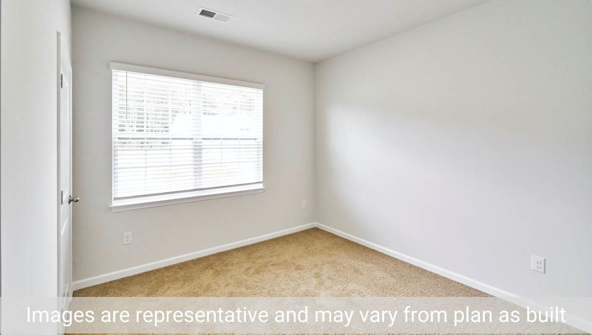 7663 Sand Pit Road Stantonsburg, NC 27883 - Photo 4 of 22 a view of a room with a window
