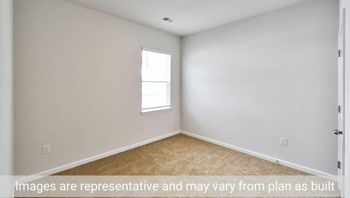 7663 Sand Pit Road Stantonsburg, NC 27883 - Photo 6 of 22 a view of an empty room and window