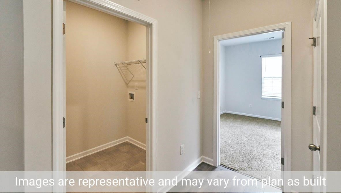 7663 Sand Pit Road Stantonsburg, NC 27883 - Photo 8 of 22 a view of a bathroom from a hallway