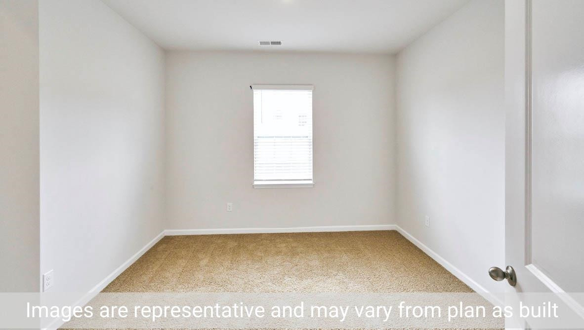 7663 Sand Pit Road Stantonsburg, NC 27883 - Photo 9 of 22 a view of a small space with wooden floor