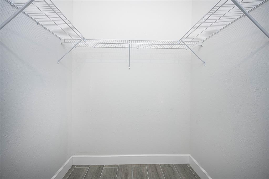 185 Sesame Road East Rotonda West, FL 33947 - Photo 28 of 60 a view of small space with racks on the wall