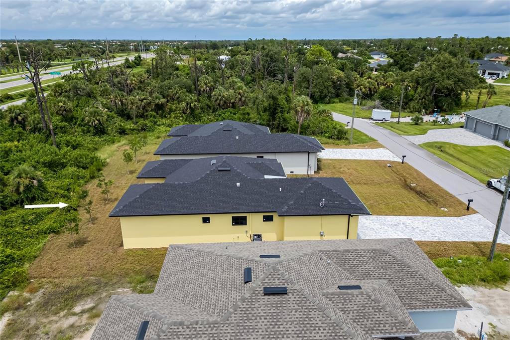 185 Sesame Road East Rotonda West, FL 33947 - Photo 44 of 60 an aerial view of a house and yard