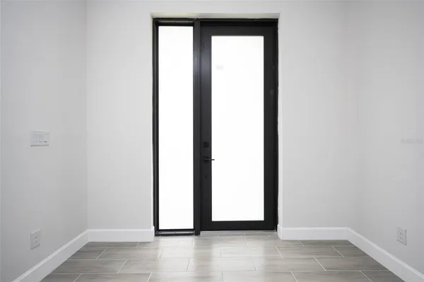 a view of a room that has a window in it