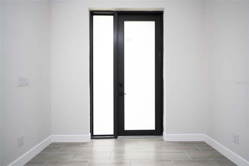 185 Sesame Road East Rotonda West, FL 33947 - Photo 5 of 60 a view of a room that has a window in it