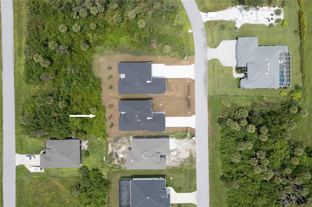 185 Sesame Road East Rotonda West, FL 33947 - Photo 53 of 60 an aerial view of a house with a yard