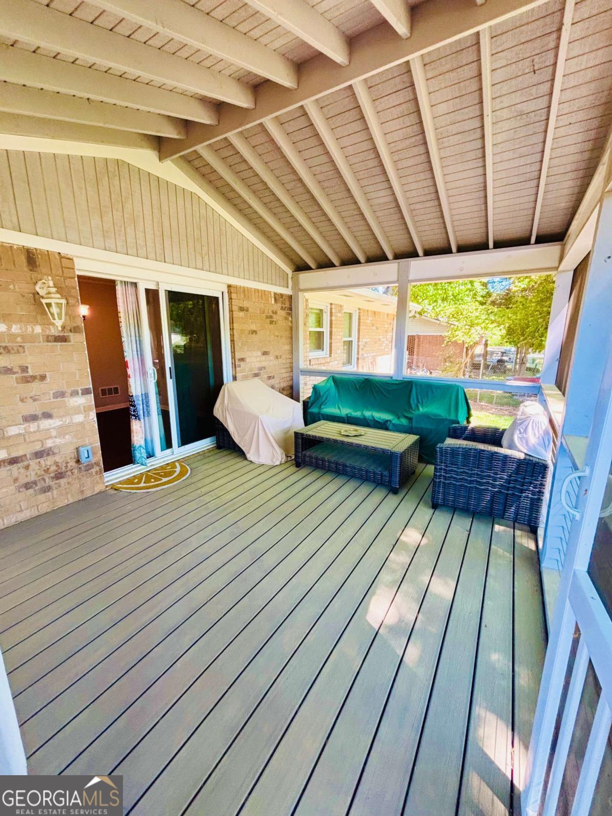 445 Vincent Drive Athens, GA 30607 - Photo 19 of 21 a view of a patio with wooden floor