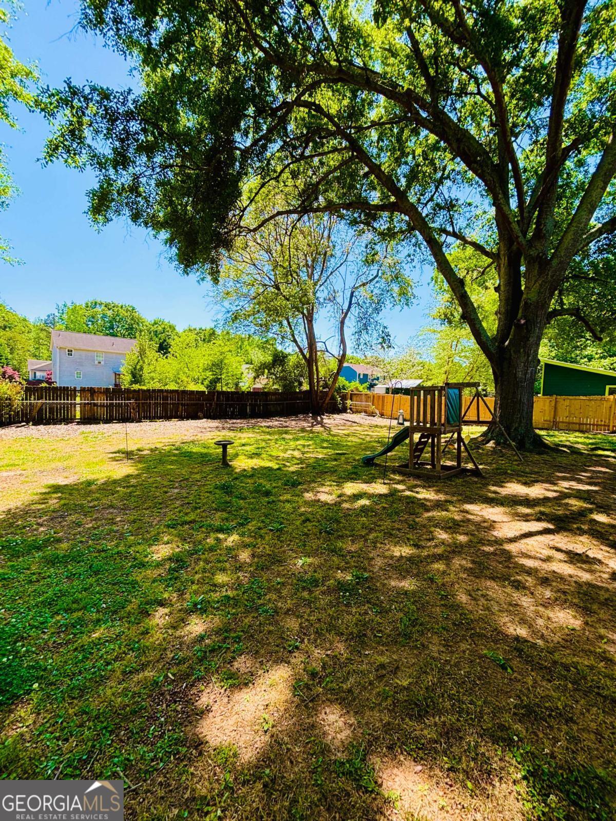 445 Vincent Drive Athens, GA 30607 - Photo 20 of 21 a view of swimming pool with a garden