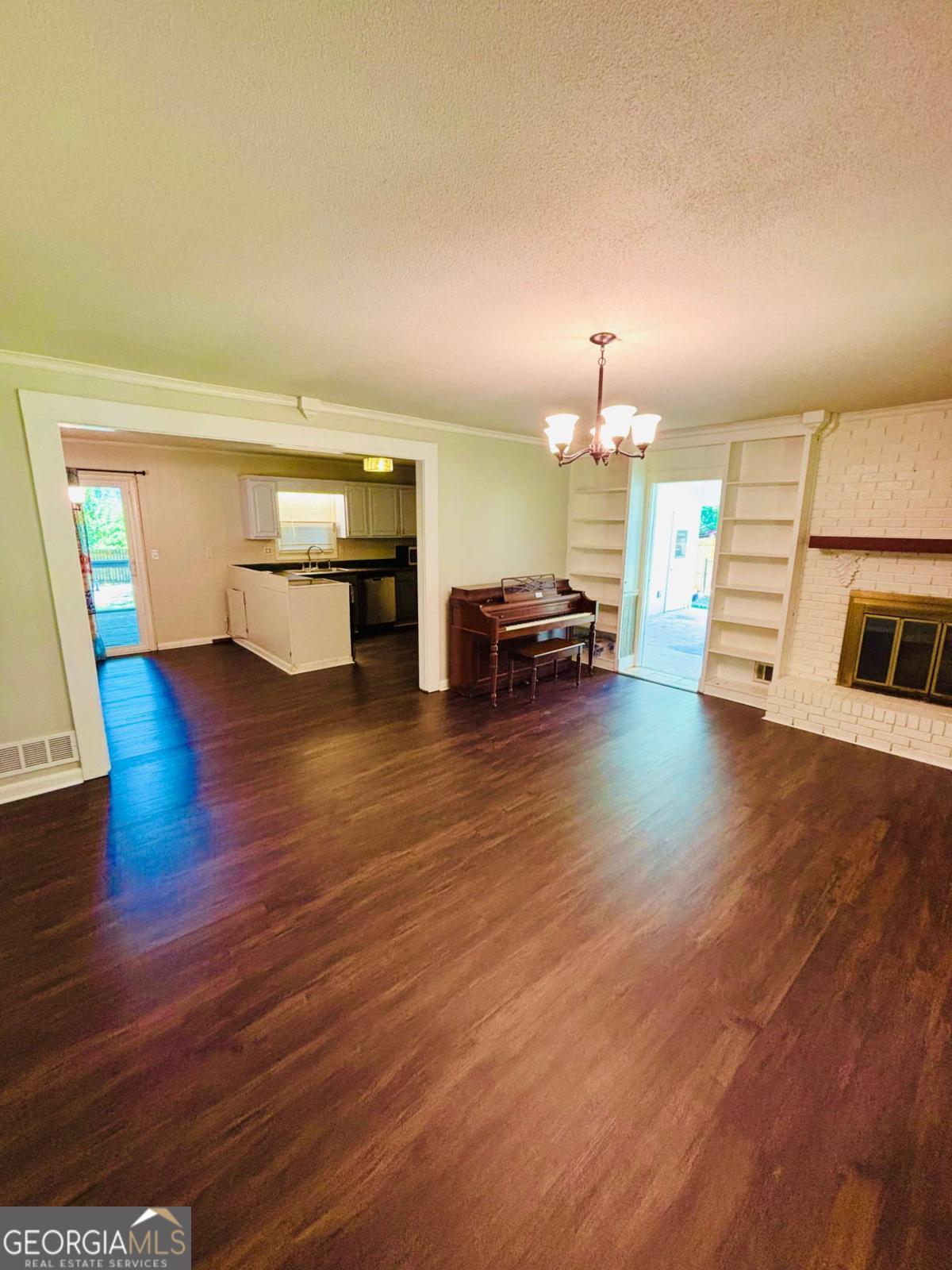 445 Vincent Drive Athens, GA 30607 - Photo 4 of 21 a living room with furniture and a wooden floor