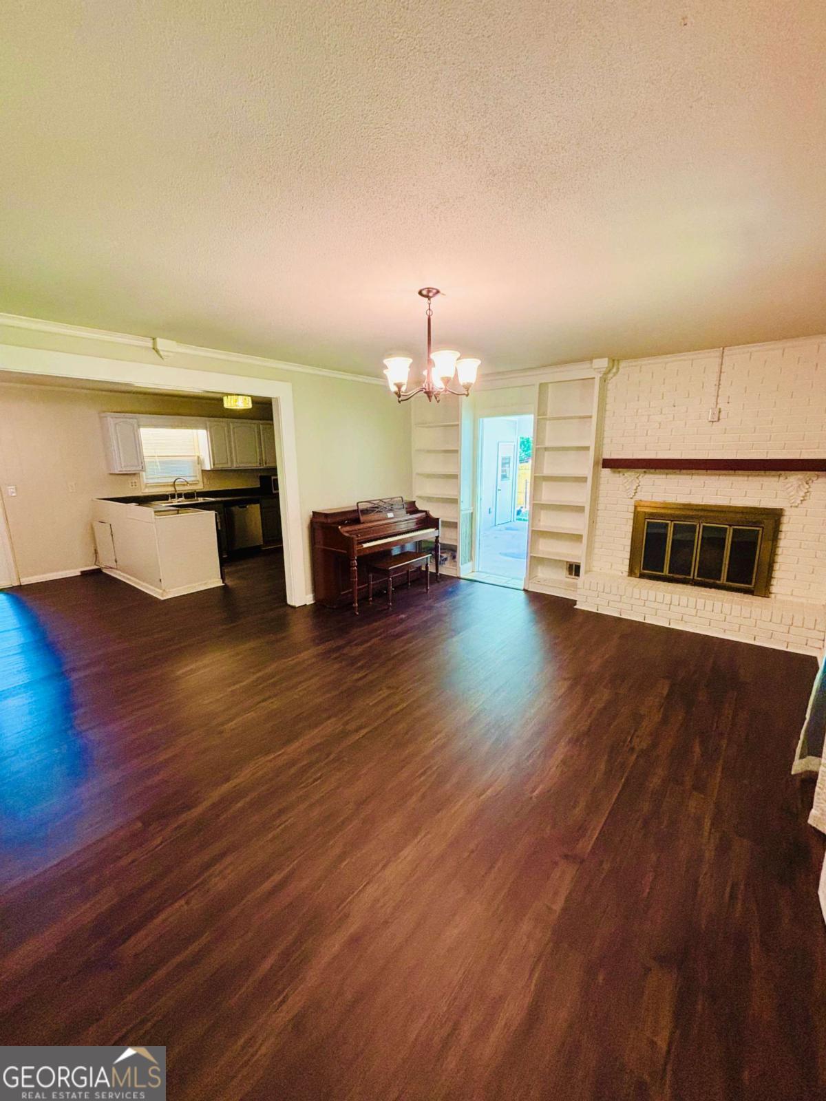 445 Vincent Drive Athens, GA 30607 - Photo 5 of 21 a living room with furniture and a wooden floor
