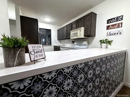 $385,000 | 7474 East Arkansas Avenue, Unit 2104, Denver, CO 80231