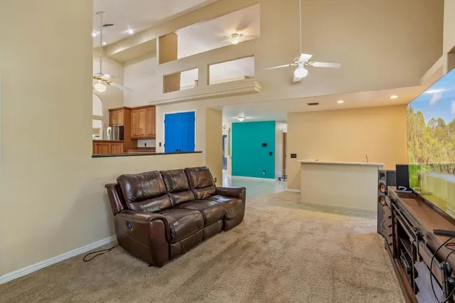 a bedroom with a bed dresser and a window