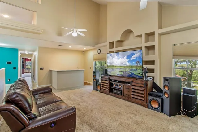 a bathroom with a double vanity sink toilet mirror and bathtub