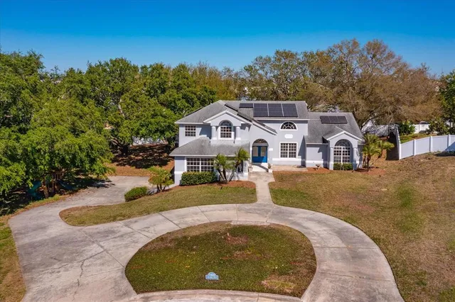 a view of a house with a swimming pool