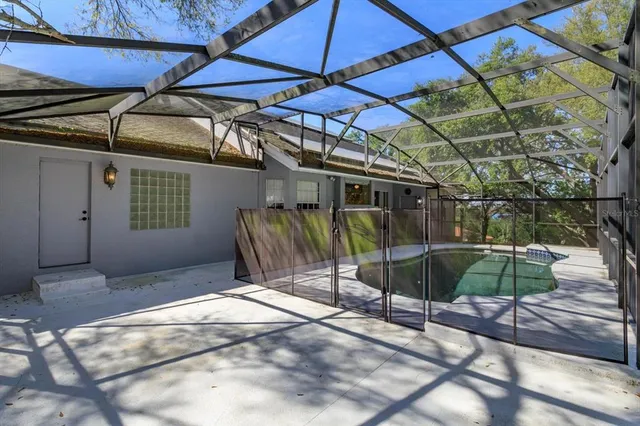 a tree in the middle of a yard