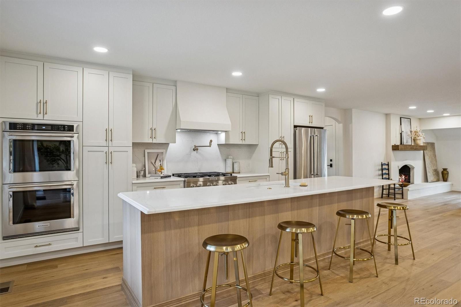 4872 Country Club Way Boulder, CO 80301 - Photo 11 of 48 a kitchen with stainless steel appliances granite countertop a stove a sink a refrigerator and a microwave