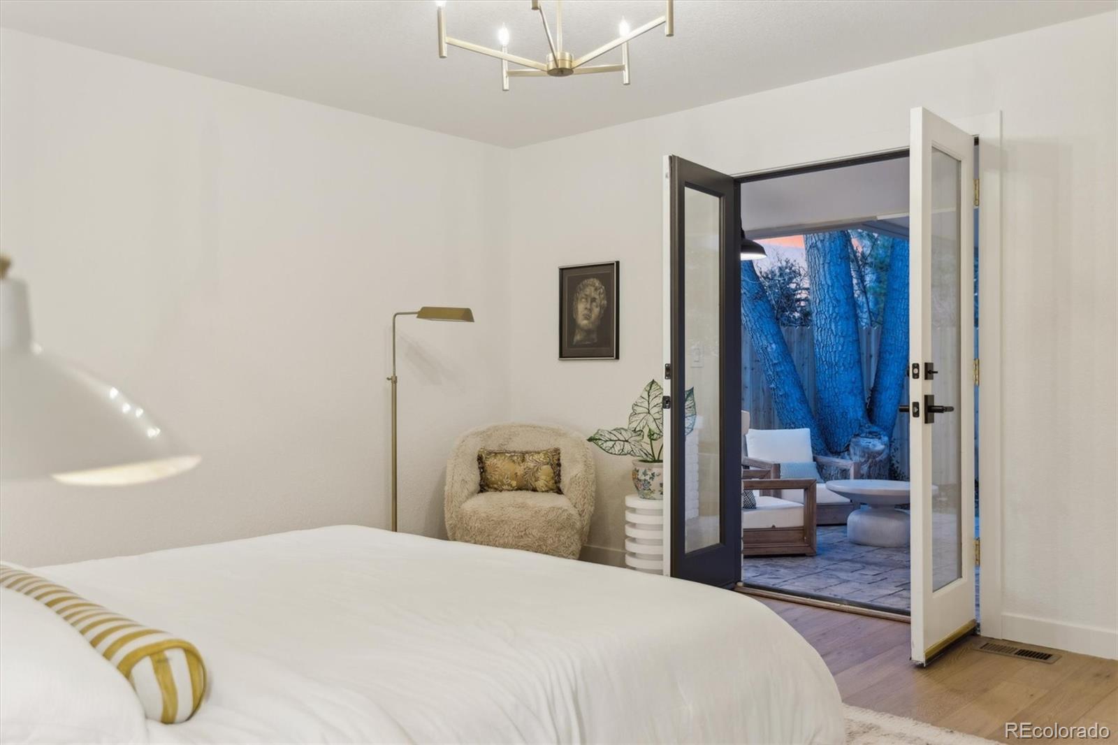 4872 Country Club Way Boulder, CO 80301 - Photo 20 of 48 a bedroom with a bed and a mirror