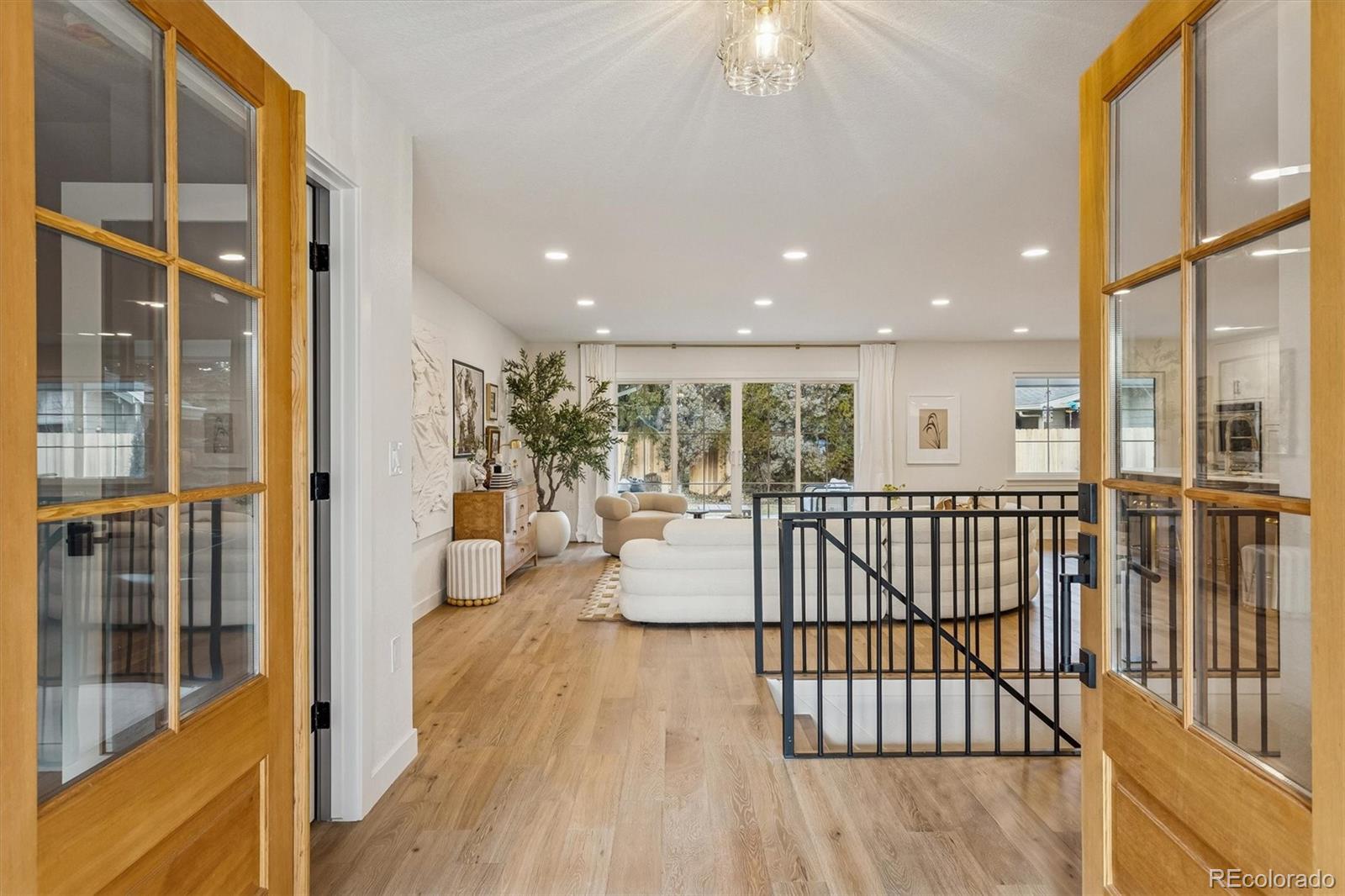4872 Country Club Way Boulder, CO 80301 - Photo 2 of 48 a view of living room with furniture and floor to ceiling window