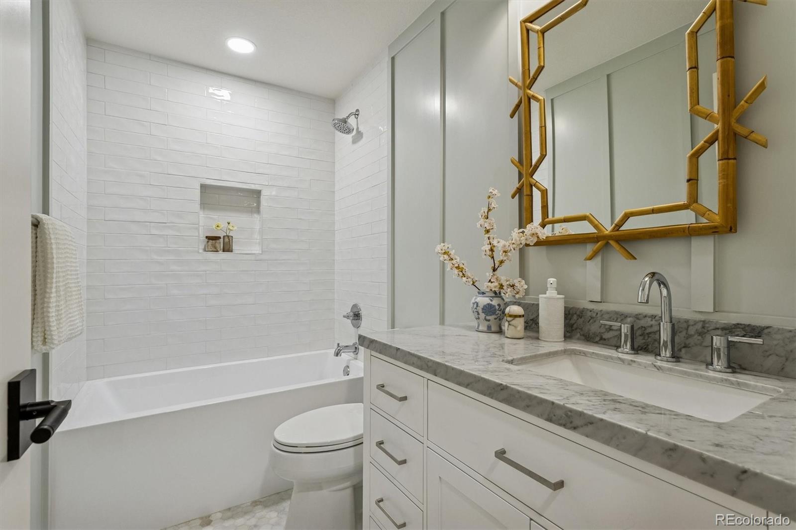 4872 Country Club Way Boulder, CO 80301 - Photo 27 of 48 a bathroom with a granite countertop sink toilet and shower