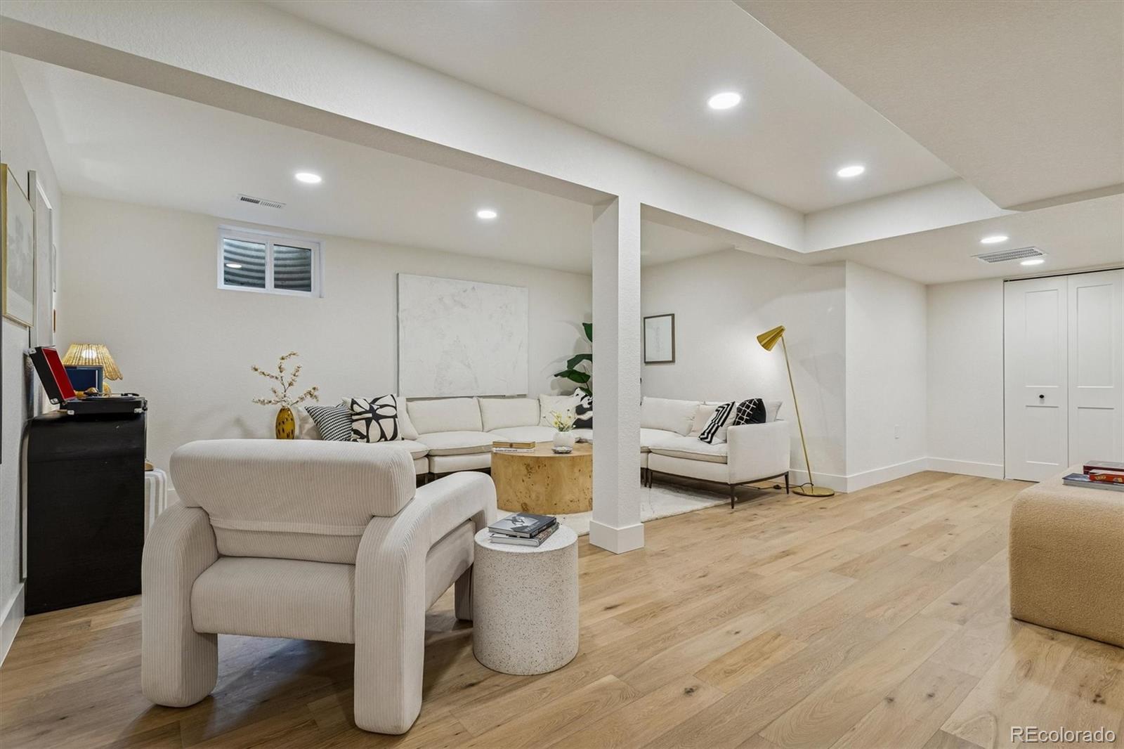 4872 Country Club Way Boulder, CO 80301 - Photo 31 of 48 a living room with furniture and a wooden floor