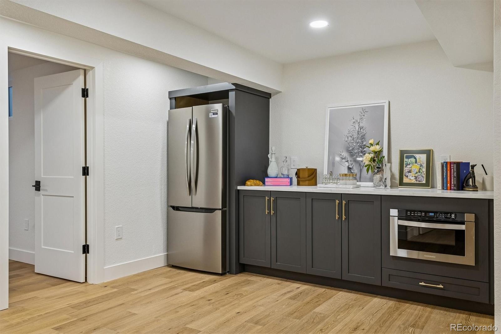 4872 Country Club Way Boulder, CO 80301 - Photo 32 of 48 a kitchen with stainless steel appliances granite countertop a refrigerator and a stove top oven