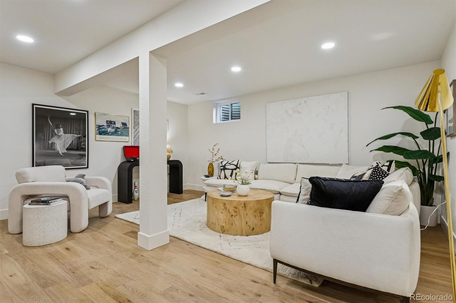 4872 Country Club Way Boulder, CO 80301 - Photo 33 of 48 a living room with furniture and wooden floor