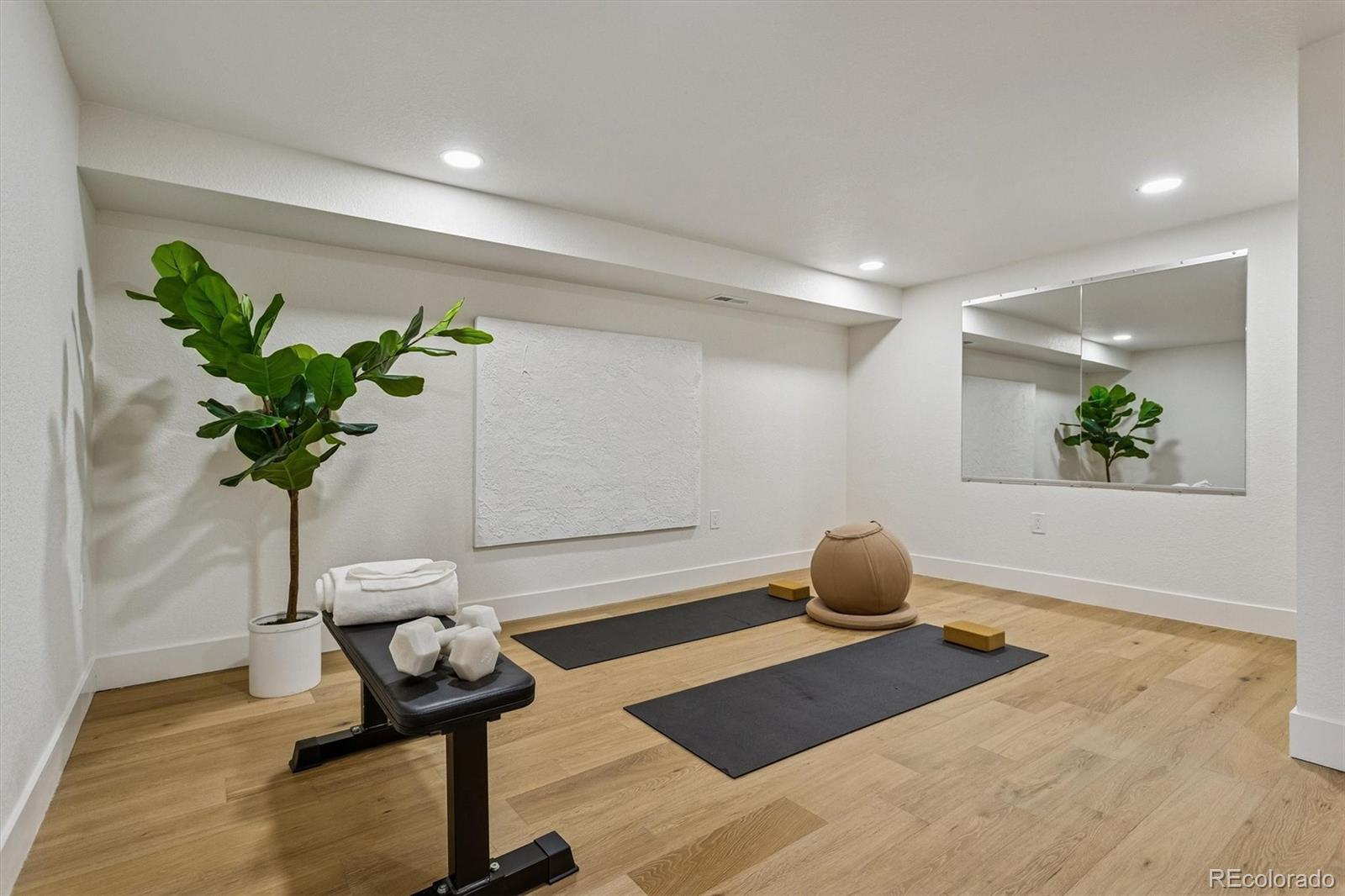 4872 Country Club Way Boulder, CO 80301 - Photo 37 of 48 a living room with furniture and a potted plant