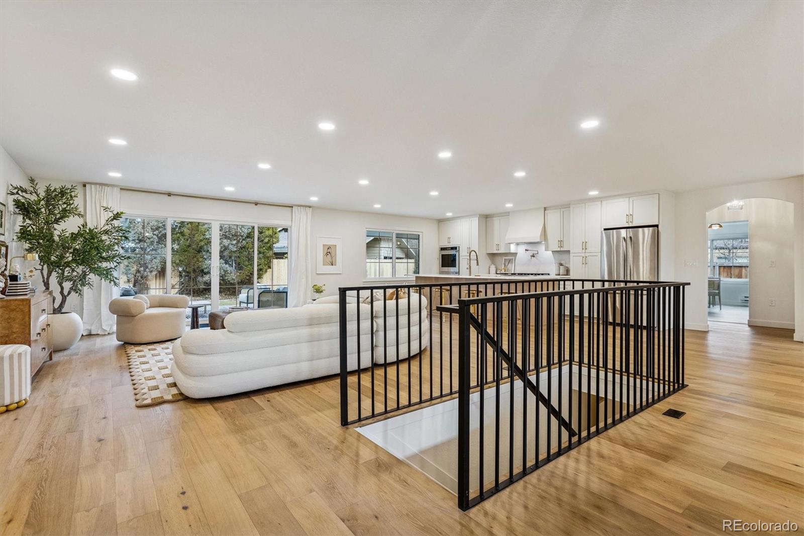 4872 Country Club Way Boulder, CO 80301 - Photo 4 of 48 a living room with furniture and a wooden floor