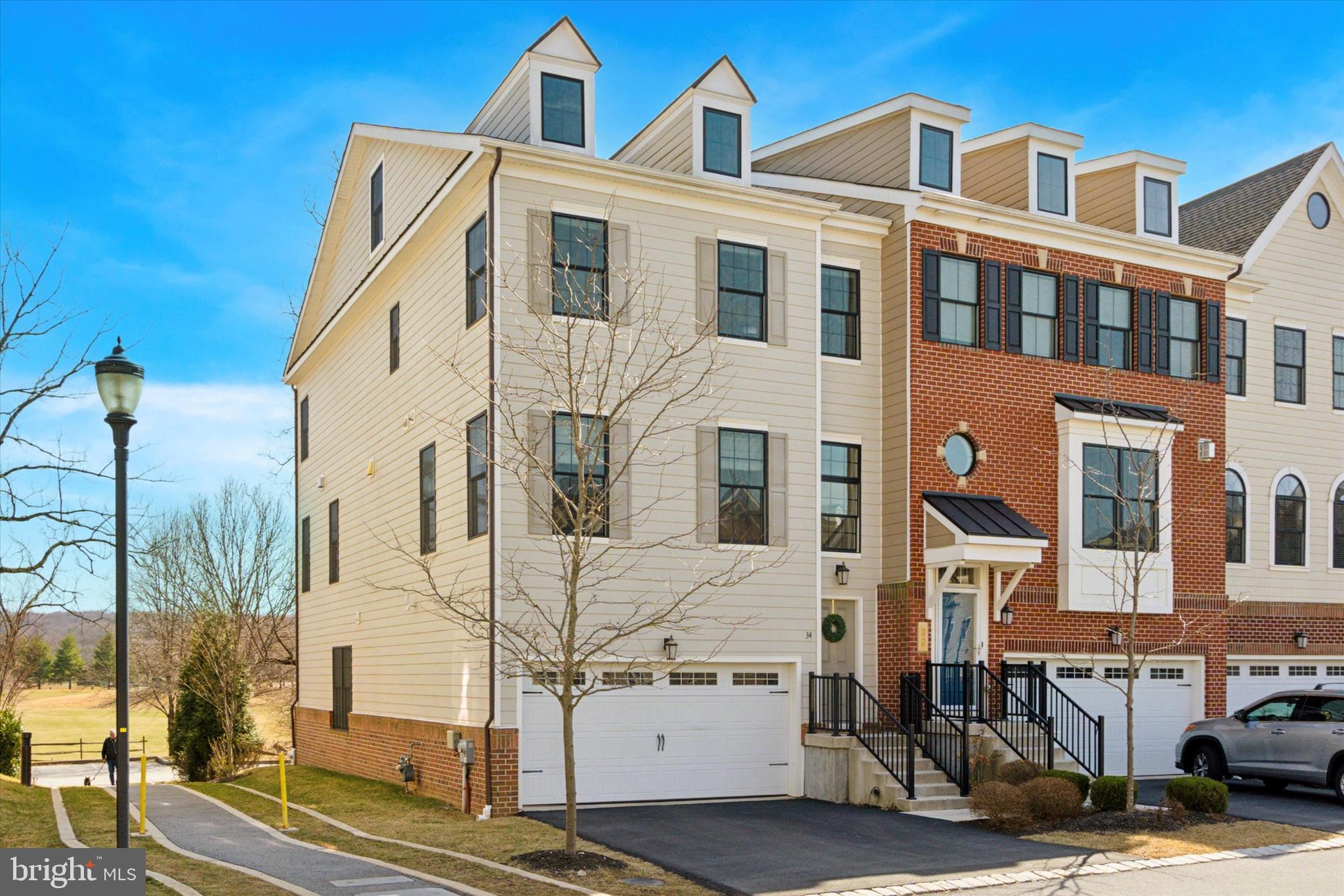 a front view of a building with many windows