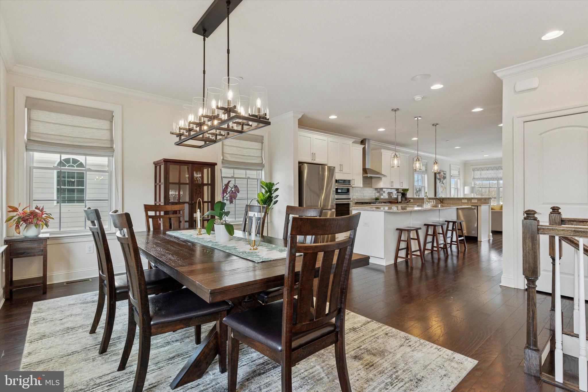 34 Parkview Cir. Wayne, PA 19087 - Photo 14 of 55 a dining room with furniture a chandelier and wooden floor