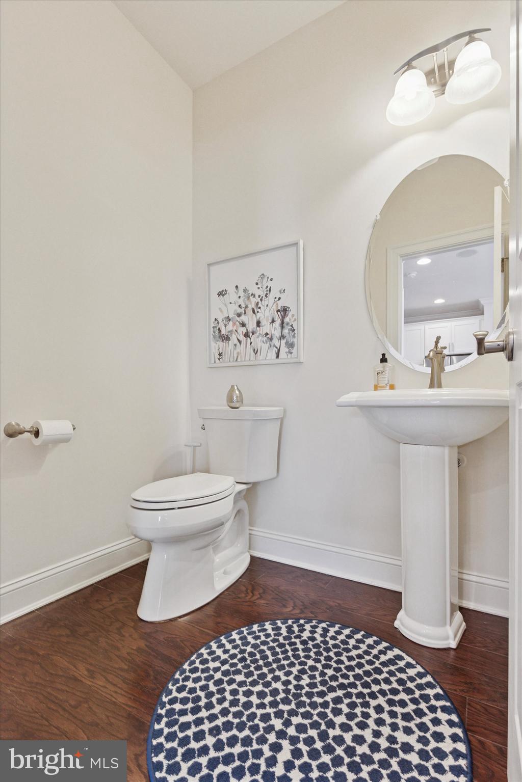 34 Parkview Cir. Wayne, PA 19087 - Photo 15 of 55 a bathroom with a sink toilet and a mirror