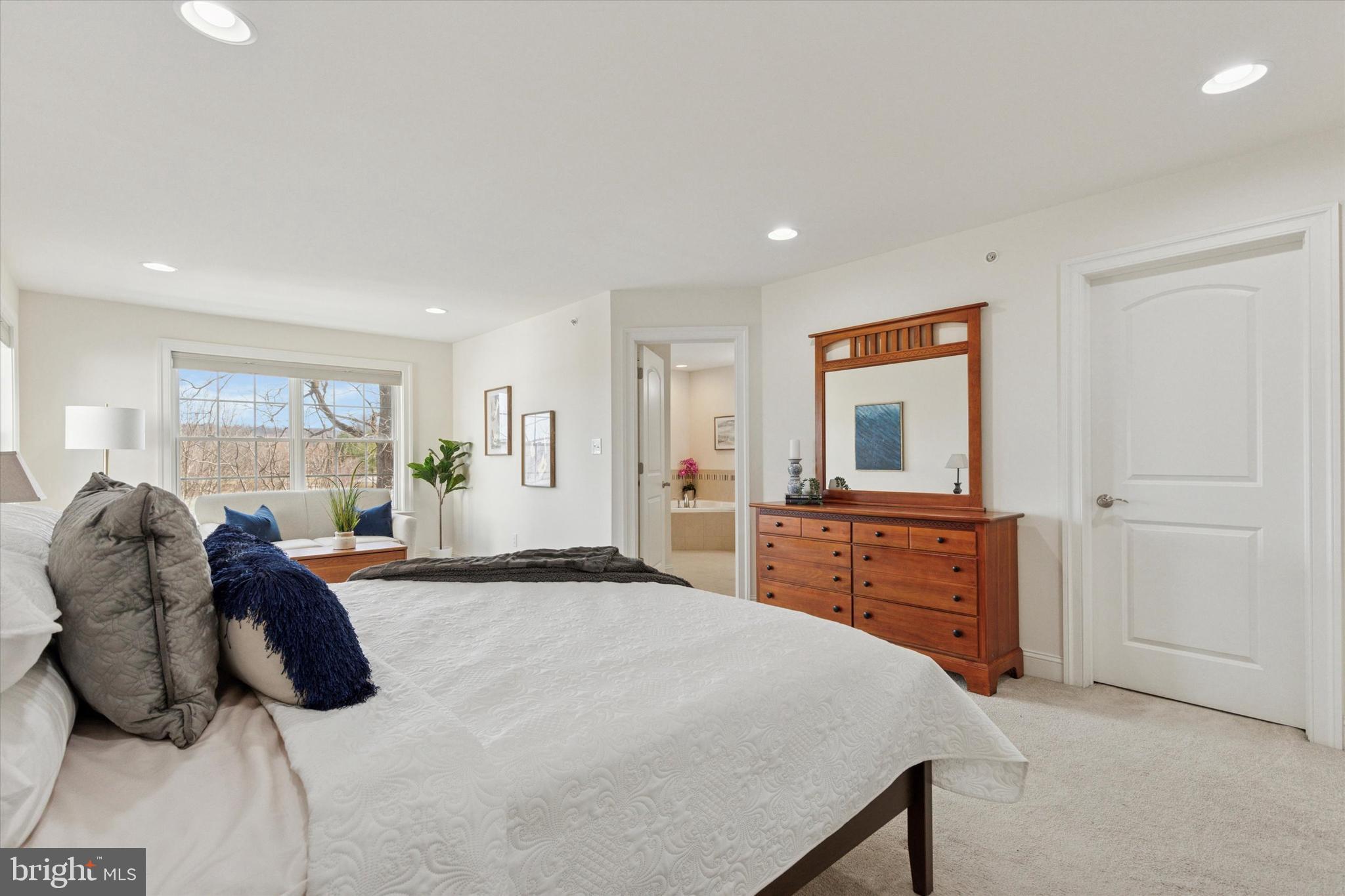 34 Parkview Cir. Wayne, PA 19087 - Photo 17 of 55 a bedroom with a large bed and a dresser