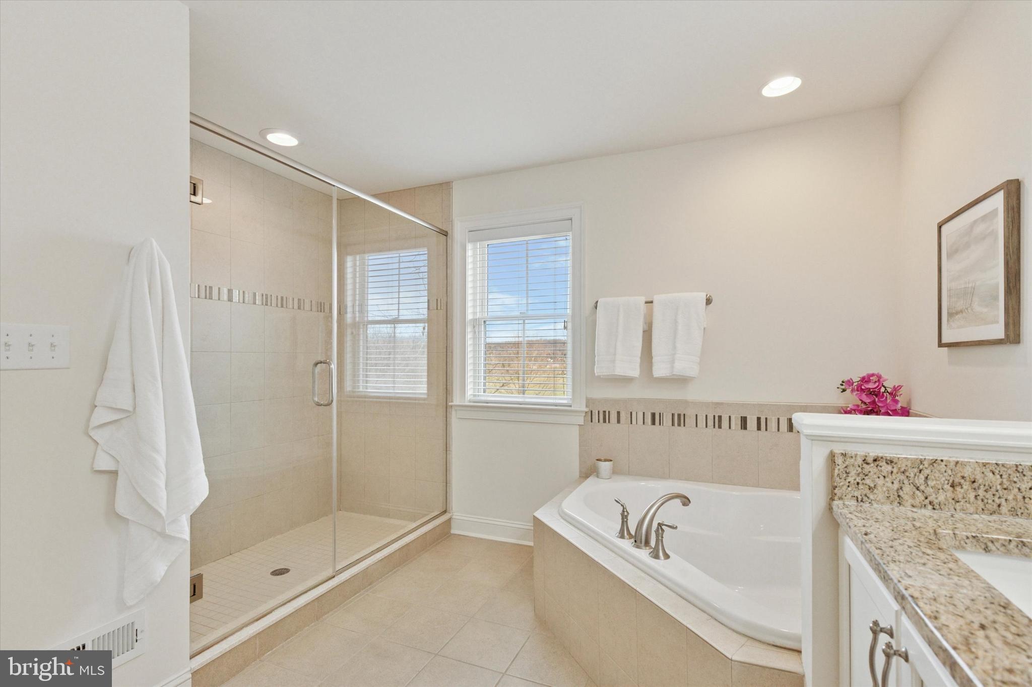34 Parkview Cir. Wayne, PA 19087 - Photo 20 of 55 a bathroom with a tub a sink and a shower