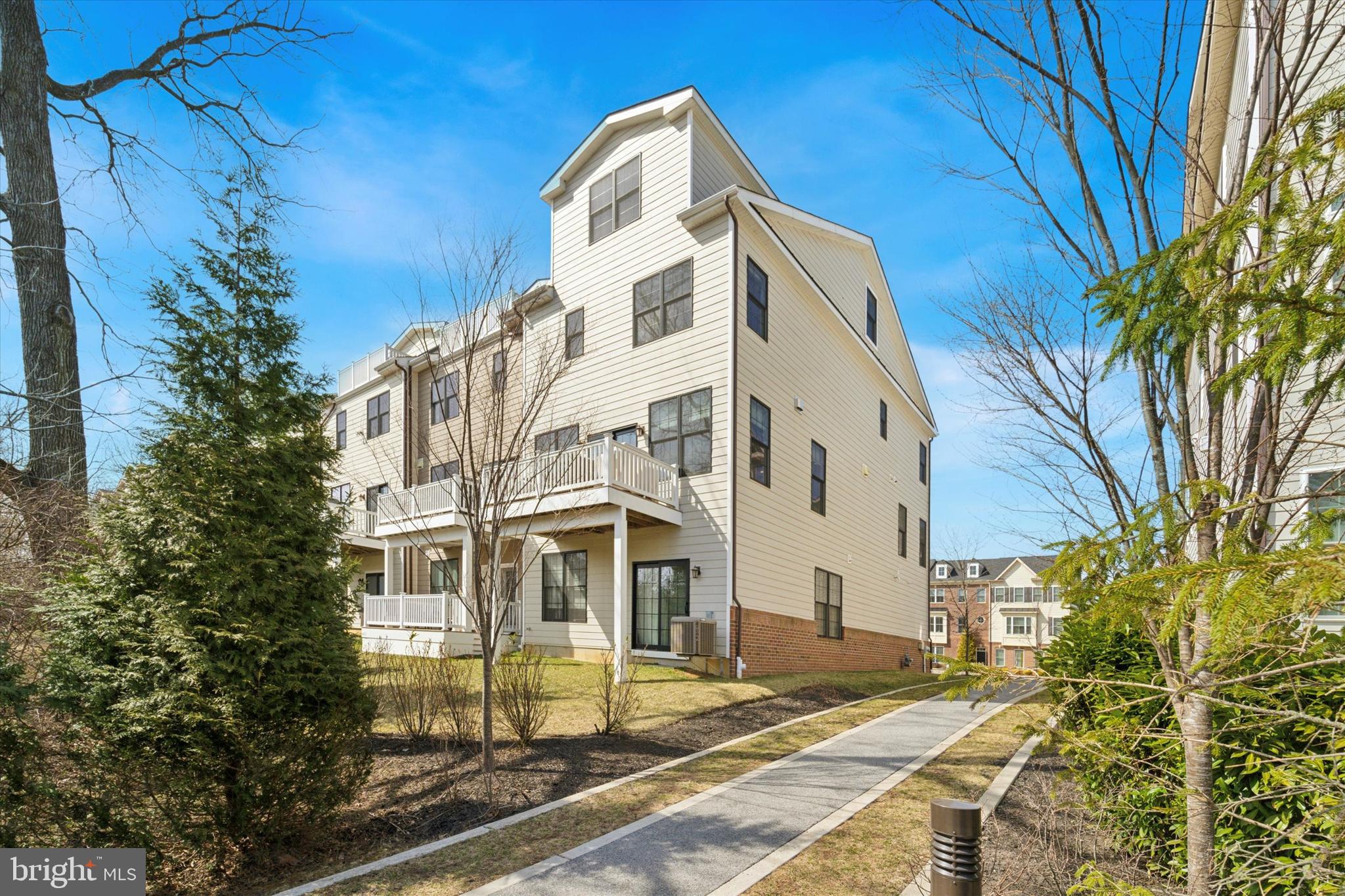 34 Parkview Cir. Wayne, PA 19087 - Photo 37 of 55 a view of a large white building with large windows