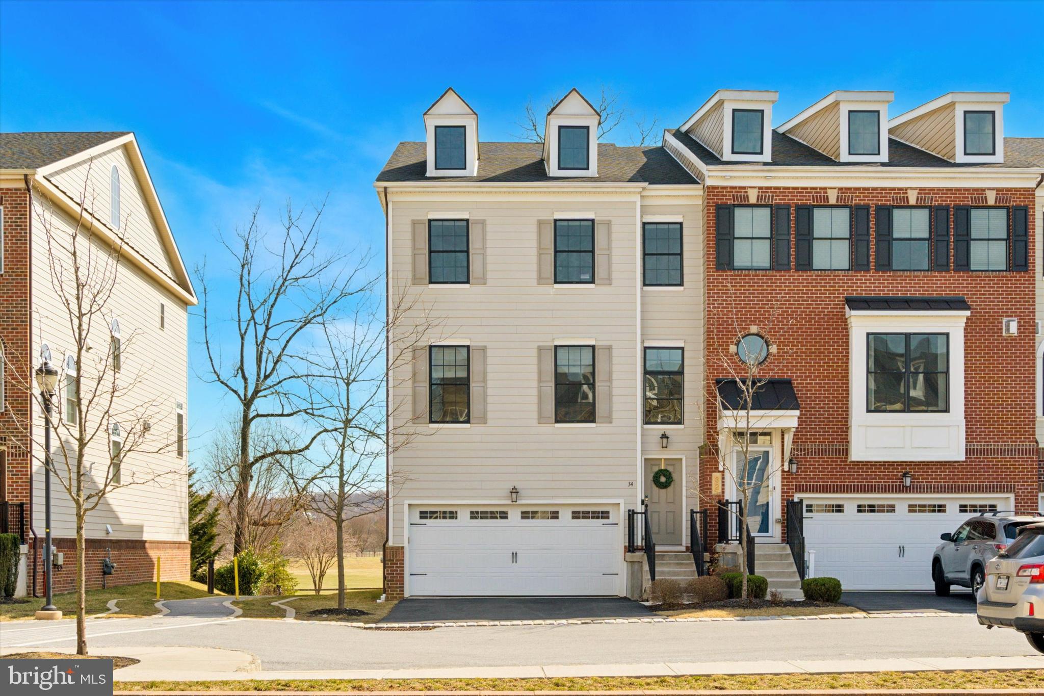 34 Parkview Cir. Wayne, PA 19087 - Photo 55 of 55 a front view of a residential apartment building with a yard