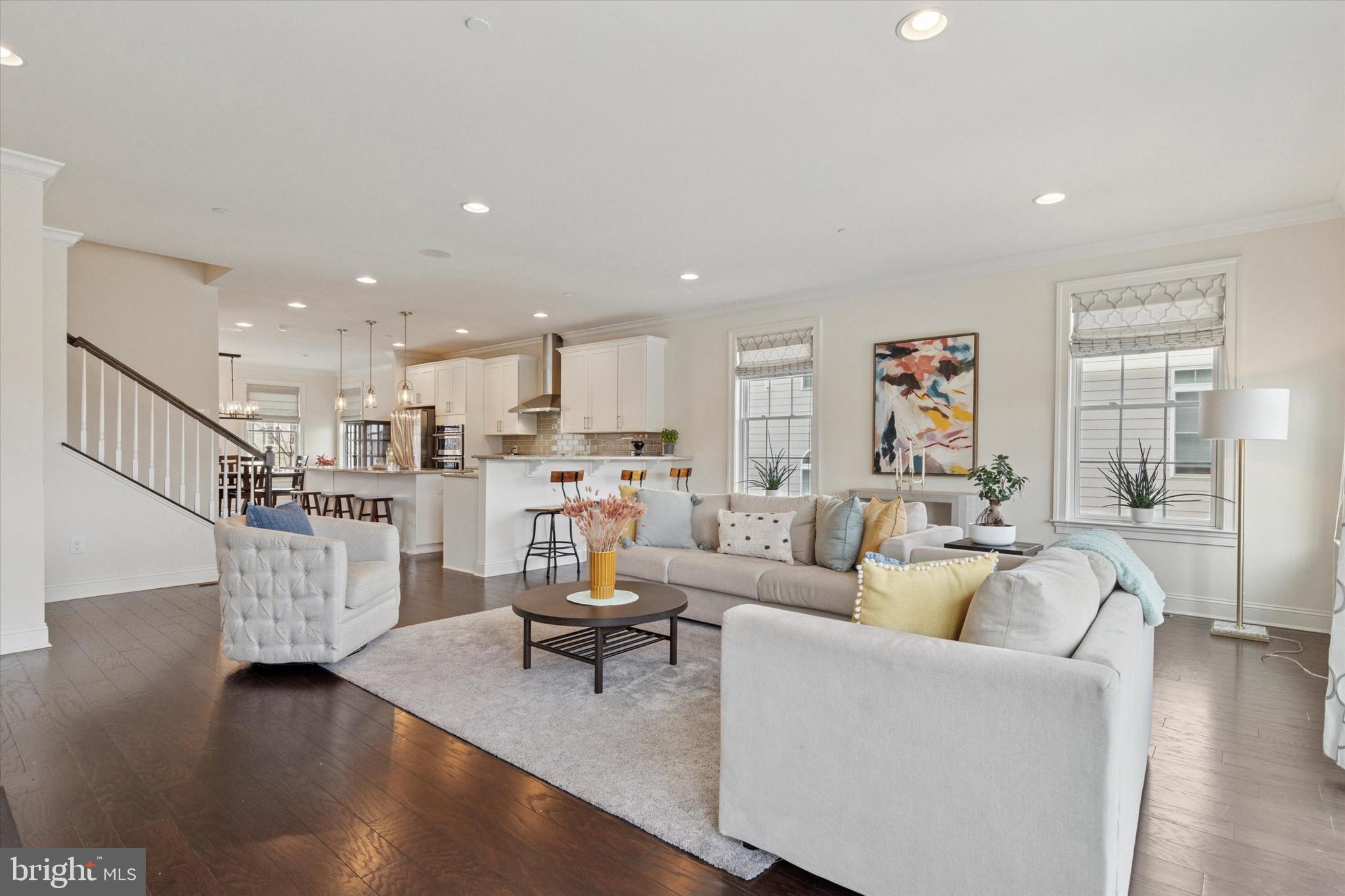 34 Parkview Cir. Wayne, PA 19087 - Photo 8 of 55 a living room with fireplace furniture and a wooden floor